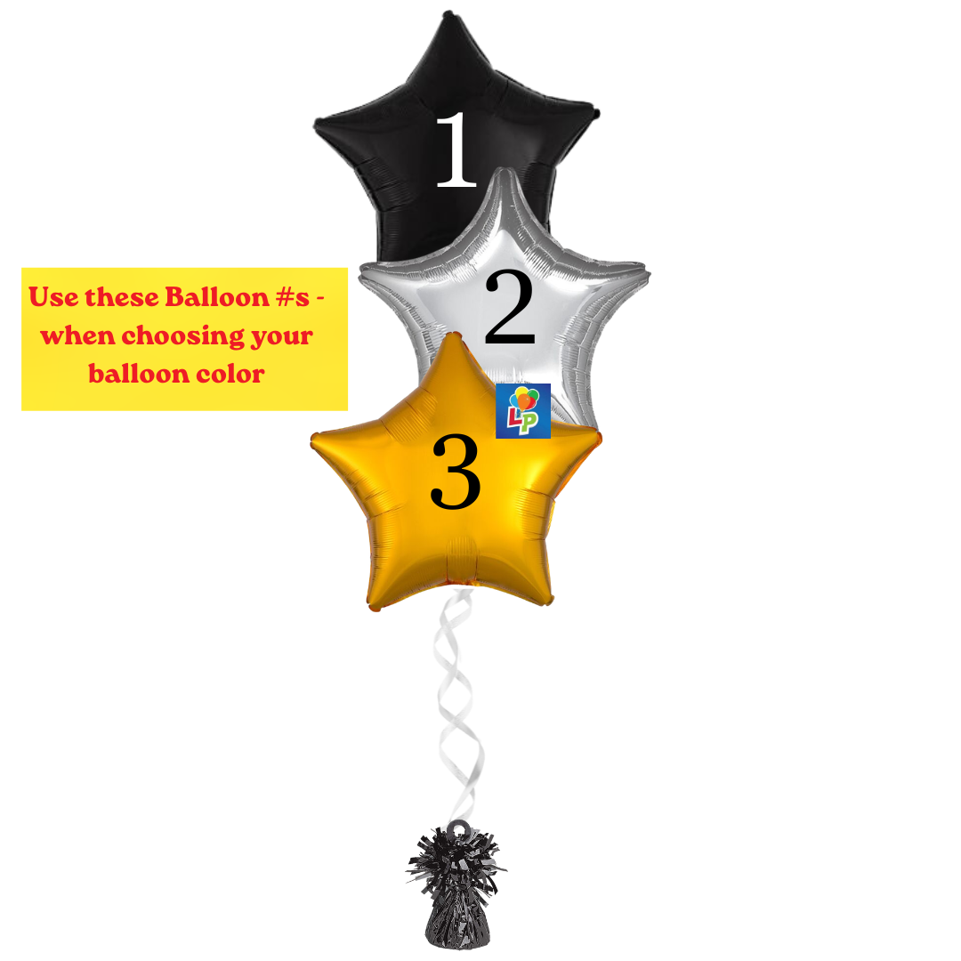 Three foil balloon numbers 1, 2, and 3 in black, silver, and gold star shapes, tied together with a white spiral ribbon and a small black balloon weight at the bottom. A yellow text box on the left reads 'Use these Balloon #s - when choosing your balloon color'.