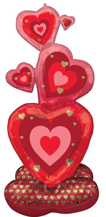 Red heart-shaped balloon with gold hearts.