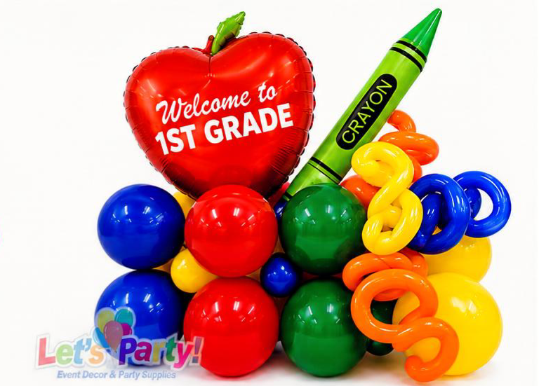 A colorful balloon decoration set for a child's first birthday, featuring a red apple-shaped foil balloon that reads 'Welcome to 1st Grade', a green crayon-shaped balloon, and multiple balloons in red, blue, green, yellow, and orange.